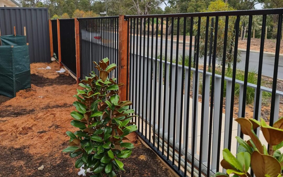 An assortment of different fence types, including wooden picket, vinyl privacy, chain link, and elegant wrought iron, showcasing a range of styles and materials for diverse property needs.