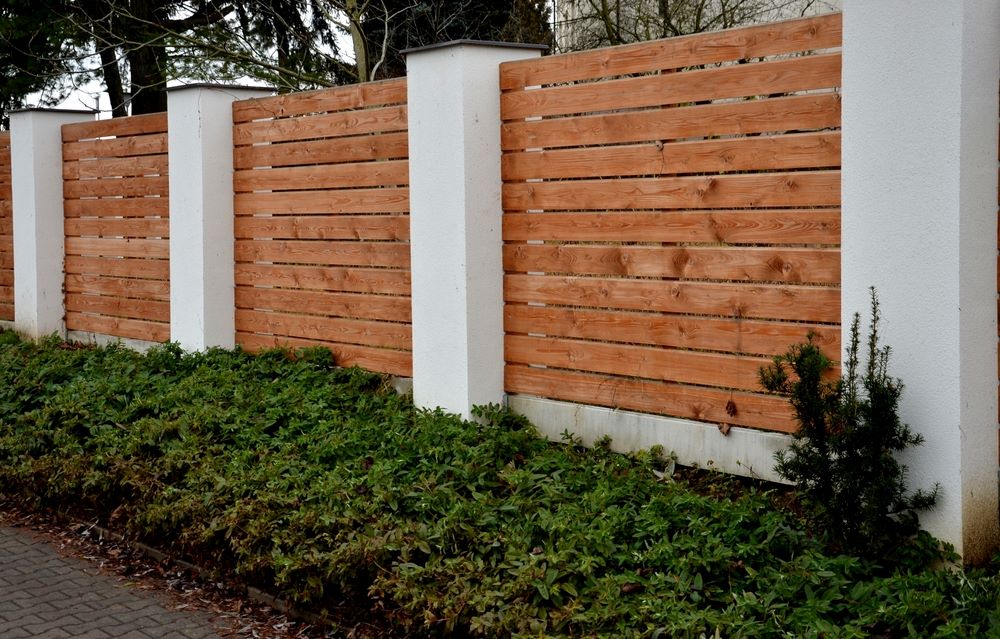The Pros and Cons of DIY vs Hiring a Timber Fencing Contractor
