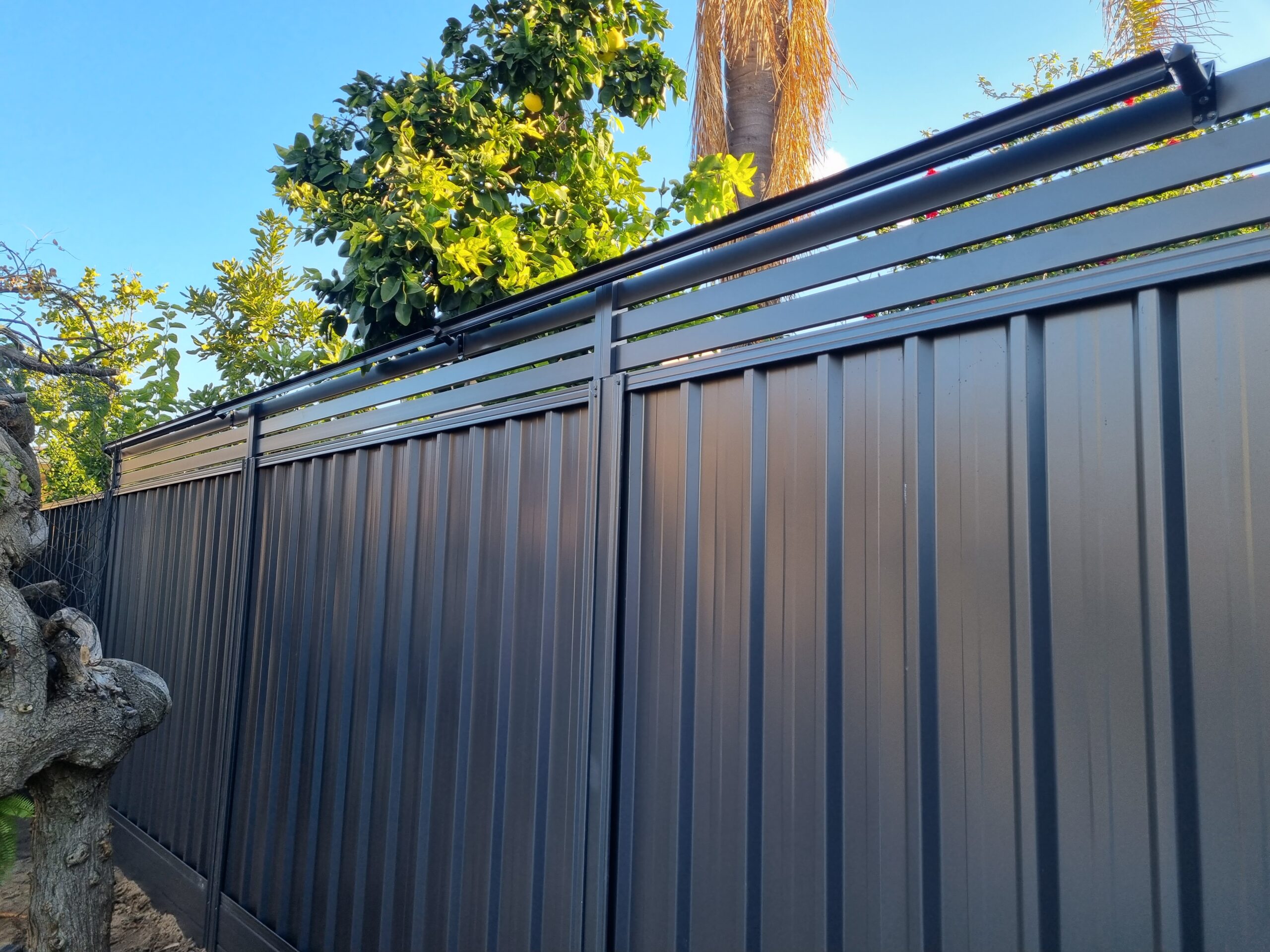 Navy colorbond fence installed in a Perth house.