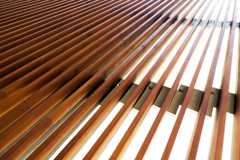 High end timber vertical batten fencing High end residential home with timber vertical batten fencing